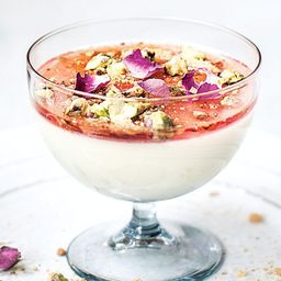 Cardamom panna cotta with rosewater syrup and pistachio praline
